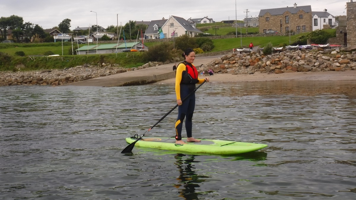 Carrying boards down to the water