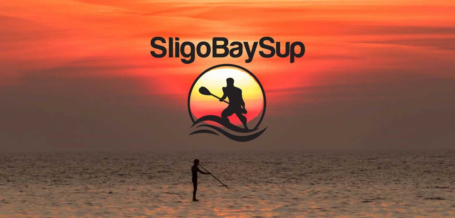 Paddleboarding at sunset in Sligo Bay