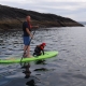 Man and child paddling off Sligo coast